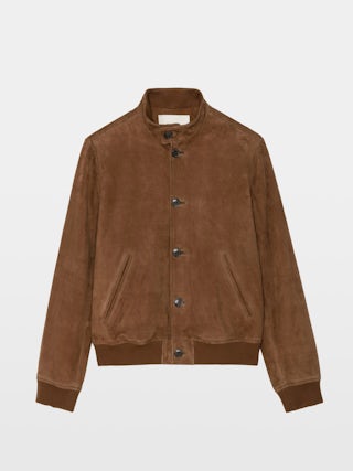 Blouson Lonni Cuir Suede - Blouson en cuir suède à col montant, fermeture boutonnée et manches longues.