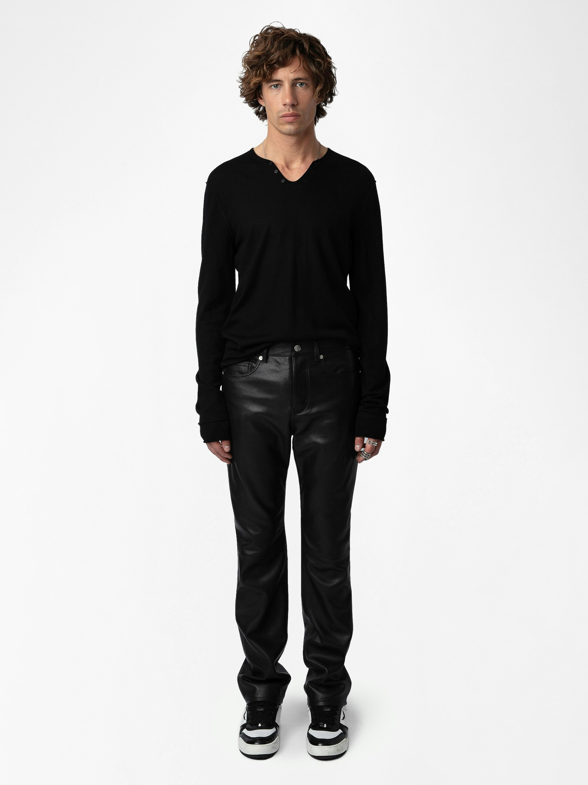 John Leather Pants - Straight-leg smooth black leather pants with pockets and topstitching.