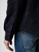 Serge Suede Shirt - Navy blue crinkled suede long-sleeved shirt with button closure.