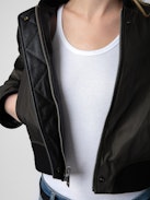 Bunta Reversible Leather Jacket - Reversible short black leather and khaki nylon jacket with zip and snap button fastening and pockets.