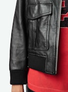 Luka Leather Jacket - Women's black leather jacket with zipper closure.