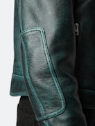 Loupa Leather Jacket - Long-sleeved short zipped jacket in dark green leather with protective collar.