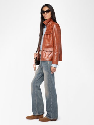 Lienna Leather Jacket - Glossy leather jacket with multiple pockets featuring zip closure and embossed wings on the back.