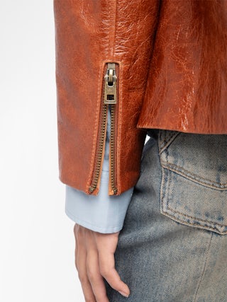 Lienna Leather Jacket - Glossy leather jacket with multiple pockets featuring zip closure and embossed wings on the back.
