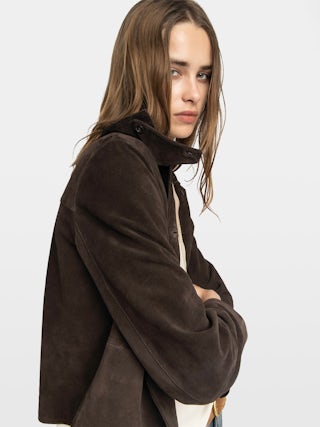 Lessa Suede Leather Jacket - Short buttoned jacket in suede leather with embossed wings on the back.
