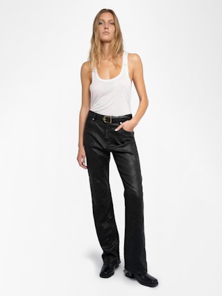 Evy Leather Pants - Make a bold statement with the Evy flared black leather pants, crafted from Zadig&Voltaire’s signature crinkled leather. Designed with a flattering flared silhouette, these pants blend edgy sophistication with modern elegance. Featuring a button and zipper closure, along with functional pockets, they offer both style and versatility. Elevate your wardrobe with these standout flared black leather pants, perfect for day-to-night styling.