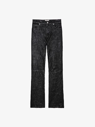 Evy Leather Pants - Make a bold statement with the Evy flared black leather pants, crafted from Zadig&Voltaire’s signature crinkled leather. Designed with a flattering flared silhouette, these pants blend edgy sophistication with modern elegance. Featuring a button and zipper closure, along with functional pockets, they offer both style and versatility. Elevate your wardrobe with these standout flared black leather pants, perfect for day-to-night styling.