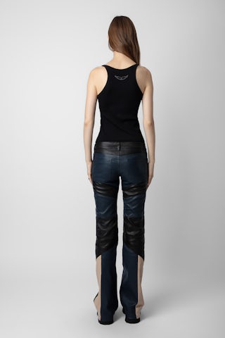 Pantalon Paulin Cuir - Pantalon en cuir d'agneau contrasté noir à détails surpiqués.