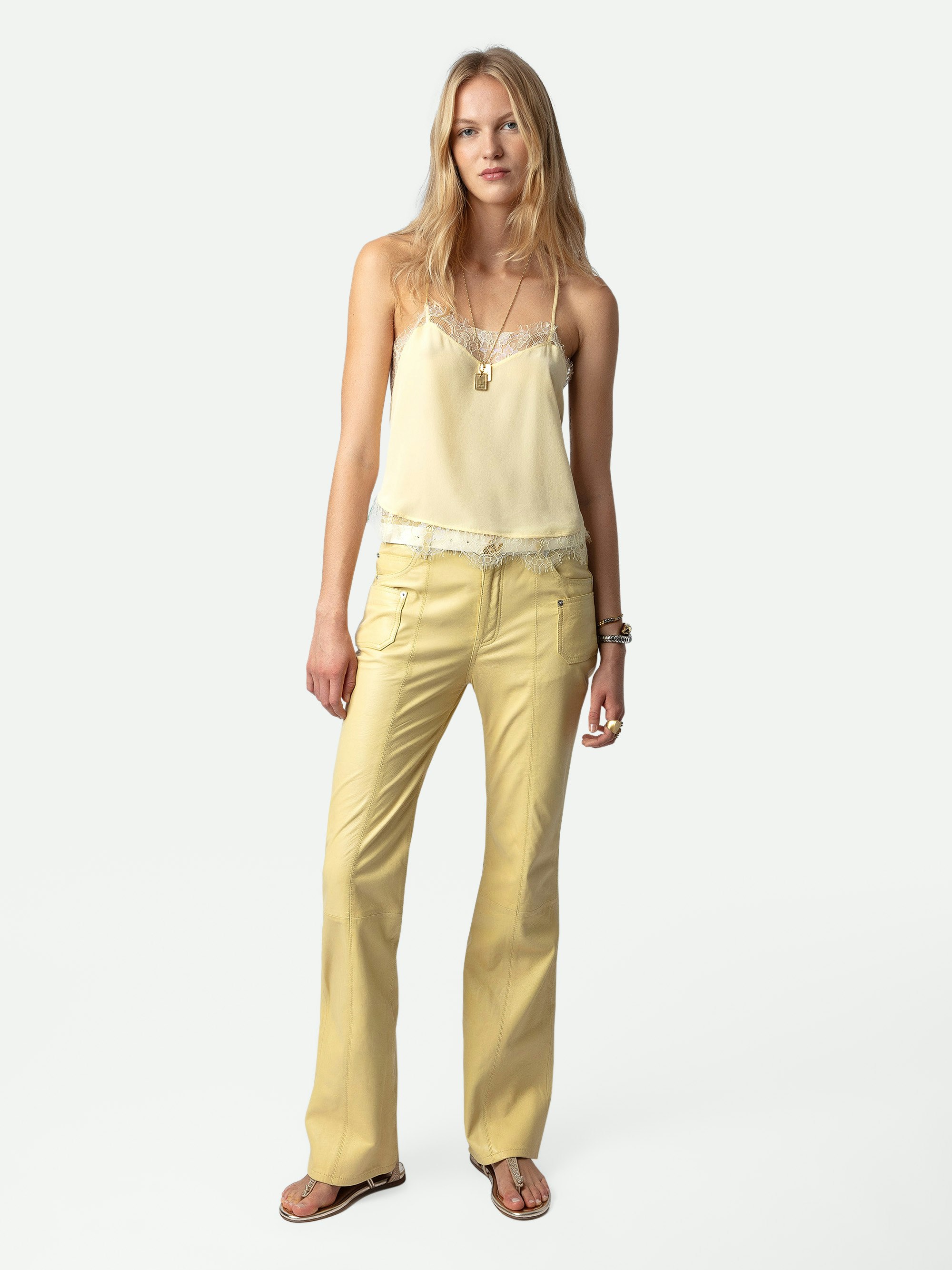 Pantaloni Elvir Pelle - Pantaloni in pelle liscia giallo chiaro con fondo svasato e tasche.