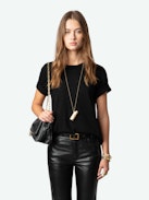 Push Leather Pants - Flared pants in smooth black leather with pockets and braided details on the belt loops.