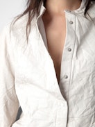 Chic Crinkled Leather Shirt - White crinkled leather shirt with press studs.
