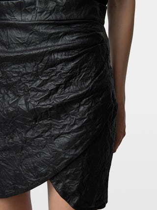Skirt Julipe Crinkled Leather - Short skirt in crinkled leather with wrap effect.