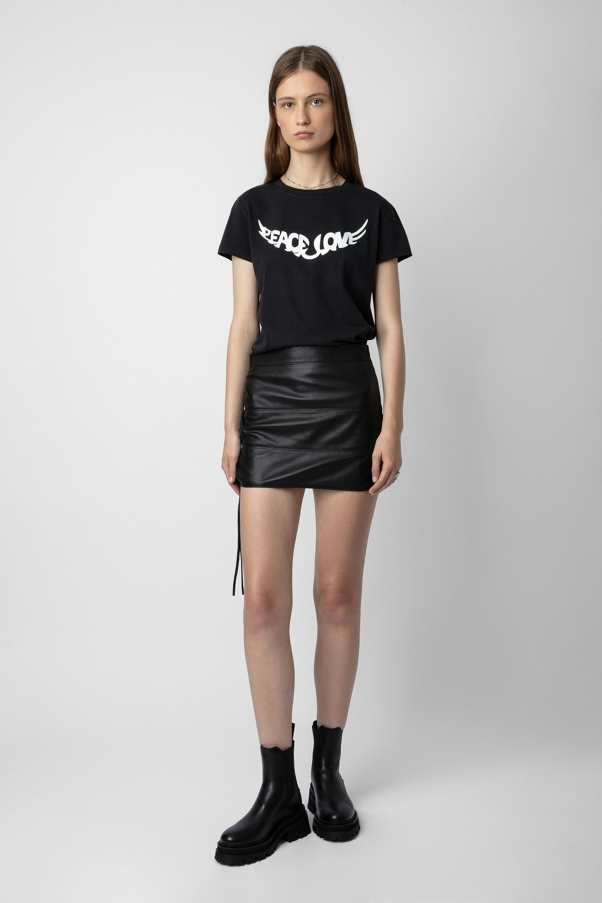 Jylo Leather Skirt - Women’s short black leather skirt with drawstrings and openings.