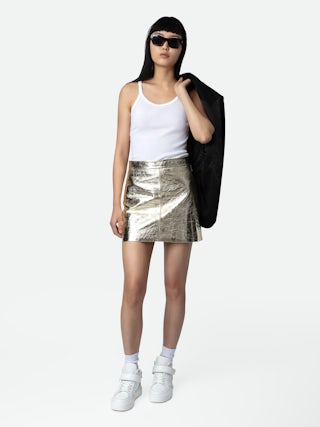 Jupe Jinette 100% Cuir - Jupe courte en cuir métallisé zippée.