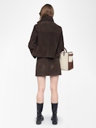 Jaime Suede Leather Skirt - Short suede leather skirt with applied pockets and back zip fastening.