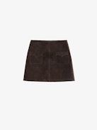 Jaime Suede Leather Skirt - Short suede leather skirt with applied pockets and back zip fastening.