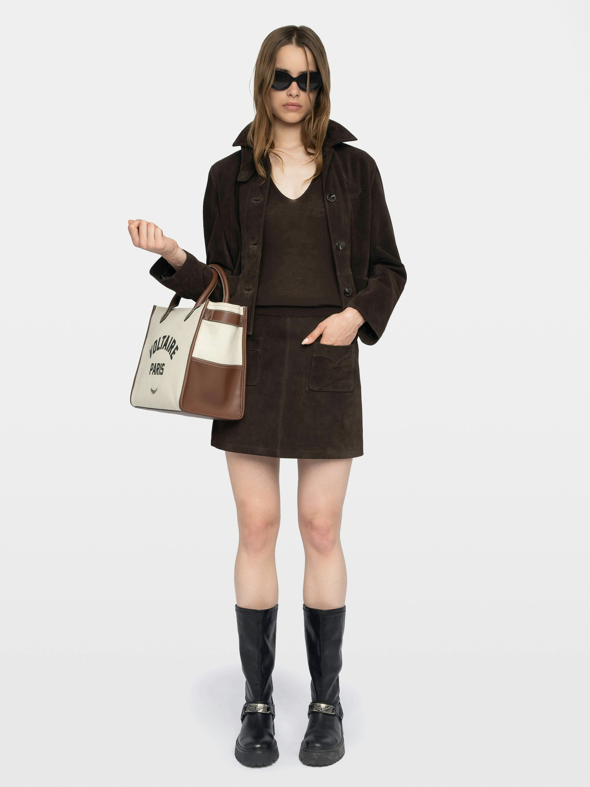 Jaime Suede Leather Skirt - Short suede leather skirt with applied pockets and back zip fastening.