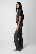 Tas Leather Top - Women’s black round-neck leather top with short sleeves.
