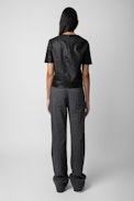 Tas Leather Top - Women’s black round-neck leather top with short sleeves.