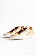 Sneakers Zadig Gold - Baskets basse dorées en cuir femme.