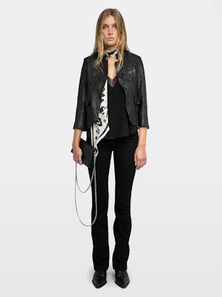 Verys Crinkled Leather Blazer - A timeless piece that embodies the brand's signature edgy elegance. Crafted from 100% lambskin, this black jacket features a distinctive crinkled texture, offering a unique twist on classic leather outerwear. Its straight cut and high collar provide a sleek silhouette, making it a versatile addition to any wardrobe.