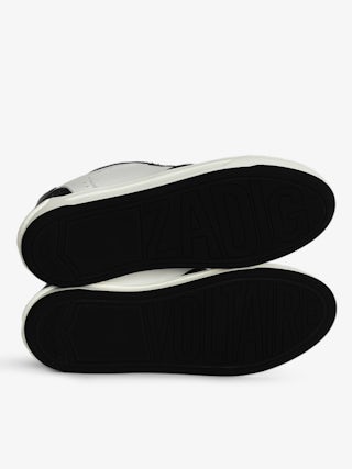 Wings Low-Top Sneakers - Low-top sneakers in smooth black and white leather with suede panels and signature wings.