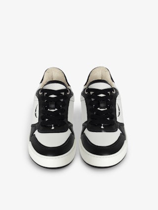 Wings Low-Top Sneakers - Low-top sneakers in smooth black and white leather with suede panels and signature wings.