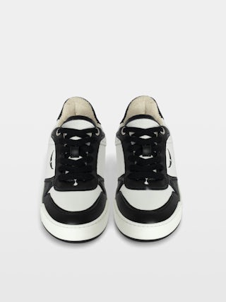 Men's Low-Top Wings Trainers - Low-top trainers in smooth white leather, with smooth black leather and vintage black leather inserts, wing signatures. These trainers are made with materials that have a reduced environmental impact.