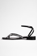 Sandali Rockzy Pelle - Sandali bassi in pelle nera con cinturini a catena donna