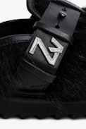 Alpha Mules - Leather and black faux fur mules with adjustable strap featuring a ZV signature