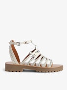 Joe Sandals - Ecru vegetable-tanned leather sandals with straps, adjustable buckle, wings charm and folk jewels.