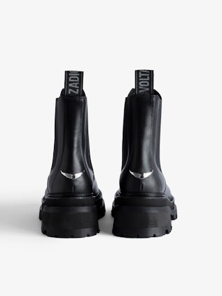 Ride Chelsea Boots - Women’s black semi-patent smooth leather Chelsea boots with wings charm.