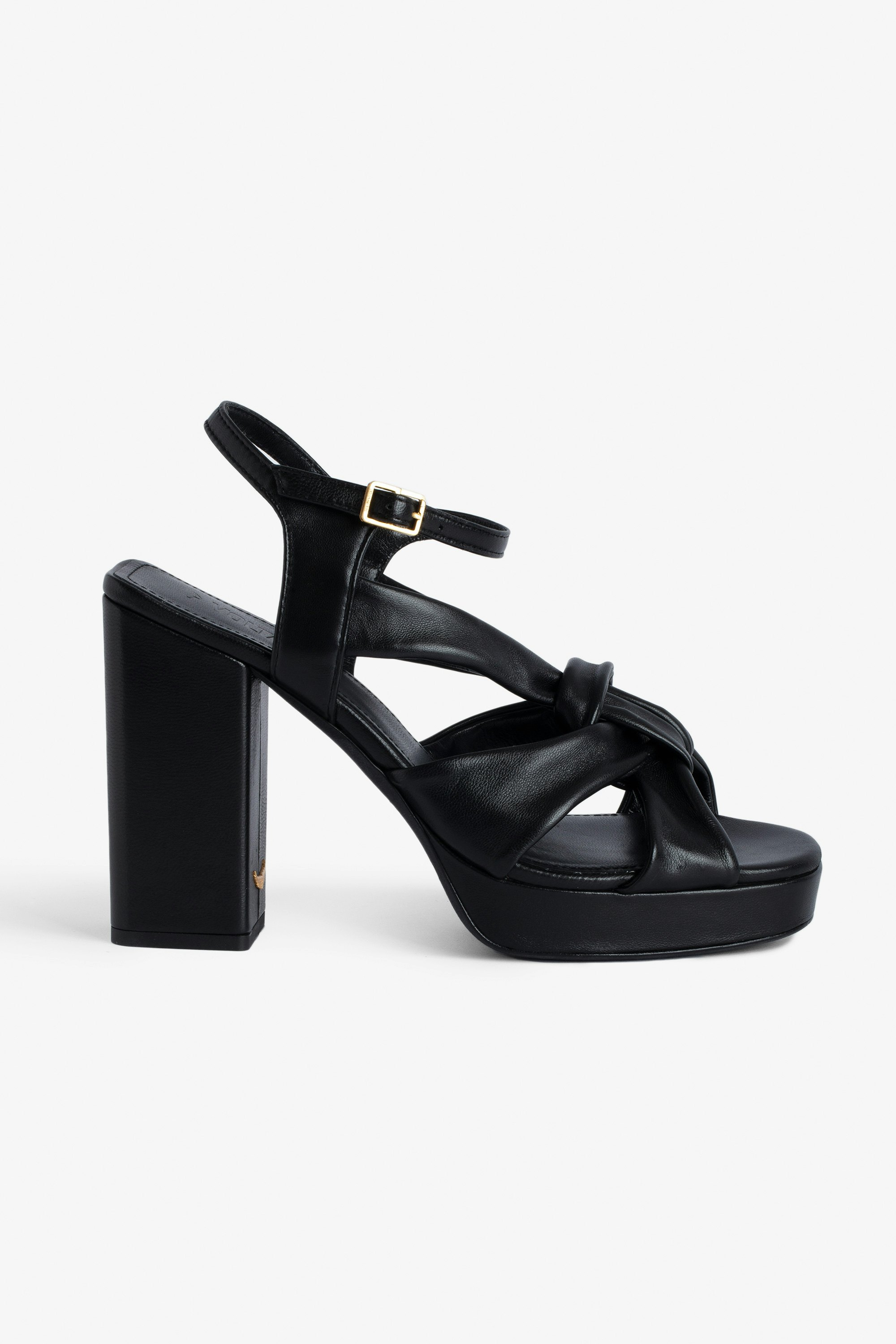Forget Me Knot Sandals Women’s black leather high-heeled sandals with strap and bow.
