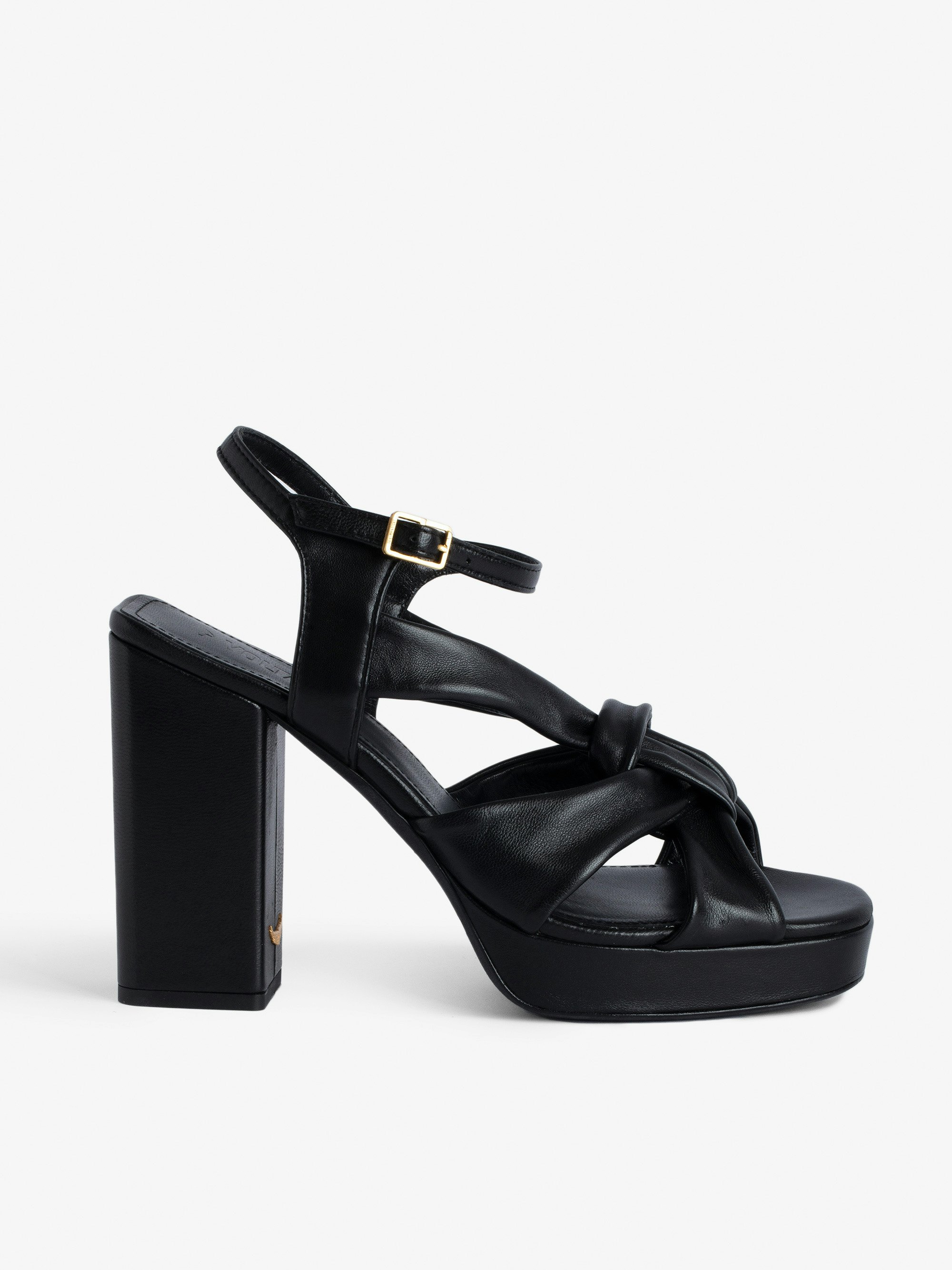 Forget Me Knot Sandals - Women’s black leather high-heeled sandals with strap and bow.