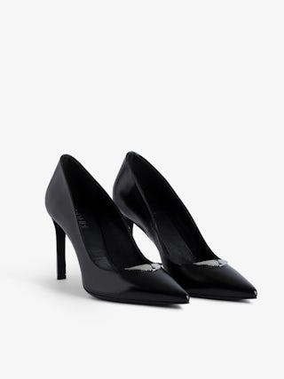 Perfect Court Shoes - Black vintage-effect leather pumps adorned with a wings charm.