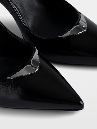Perfect Court Shoes - Black vintage-effect leather pumps adorned with a wings charm.