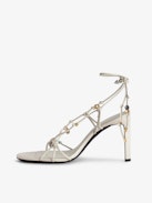 Alana Sandals - Women's white smooth leather heeled sandals with tied straps and charms.