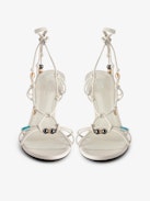 Alana Sandals - Women's white smooth leather heeled sandals with tied straps and charms.