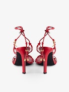 Alana Sandals - Red smooth leather heeled sandals with tied straps and charms.