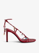 Alana Sandals - Red smooth leather heeled sandals with tied straps and charms.