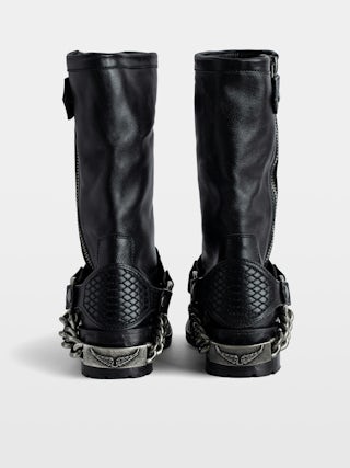 Igata Boots - Black vegetable-tanned leather ankle boots adorned with metal curb chains.