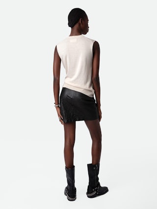 Igata Boots - Black vegetable-tanned leather ankle boots adorned with metal curb chains.