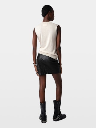 Igata Boots - Black vegetable-tanned leather ankle boots adorned with metal curb chains.