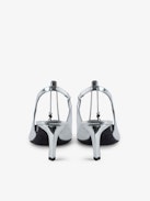 First Night Court Shoes - Silver patent leather court shoes with leather strap and metal chain.