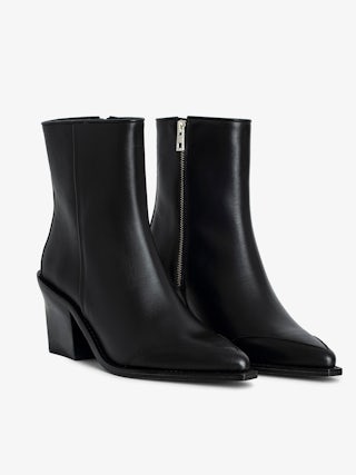 Cara Ankle Boots - Smooth, semi-patent black leather ankle boots with signature wings.