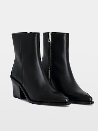 Cara Ankle Boots - Black semi-glossy smooth leather ankle boots adorned with a wing signature.