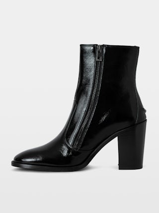 Preiser Ankle Boots - Vintage-effect leather ankle boots, adorned with a zip and embossed wings on the heel.