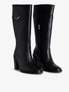Preiser Tall Boots - Women's black tall leather boots with wings charm on calves.