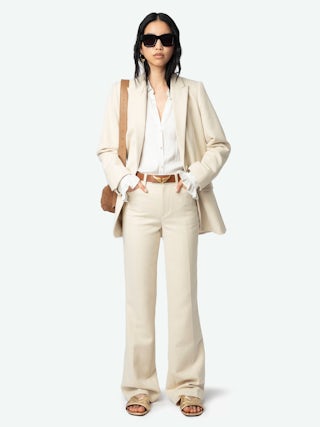 Azora Mules - A harmonious blend of edgy design and luxurious craftsmanship. These mules feature a metallic crinkled leather exterior, exuding a bold yet sophisticated allure. The embossed signature wings add a distinctive touch, embodying the brand's rebellious spirit. Designed with a square toe and crossover strap at the toe, they offer both style and comfort.