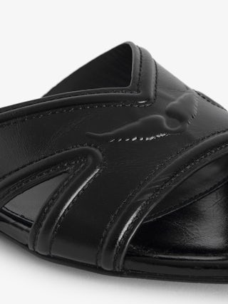 Azora Vintage Patent Mules - A perfect blend of vintage charm and modern sophistication. These leather mule sandals are crafted from premium vintage-effect leather, offering a timeless appeal. The design is accentuated by embossed signature wings, adding a distinctive touch that embodies the brand's edgy aesthetic. Elevate your footwear collection with these leather mule sandals that seamlessly combine comfort and style.